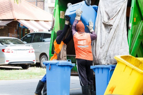 Professional waste clearance team at a construction site